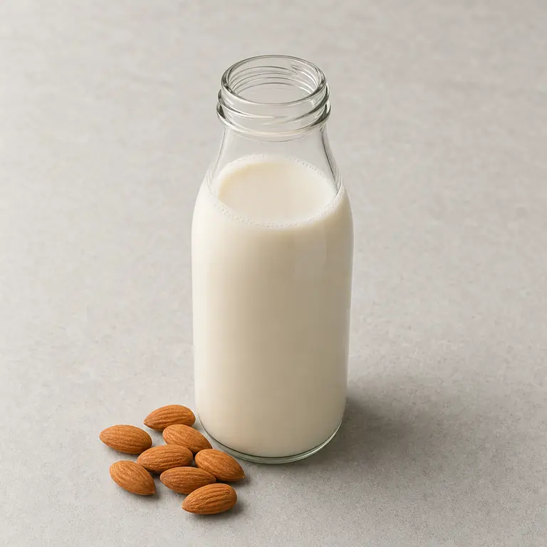 Almond milk (opened) on a neutral surface
