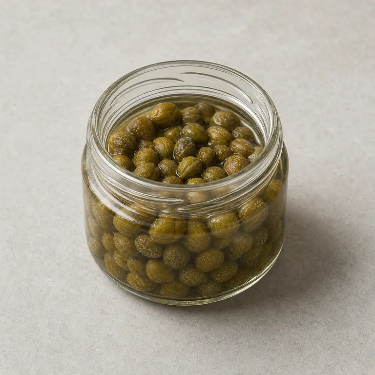 Capers (opened) on a neutral surface