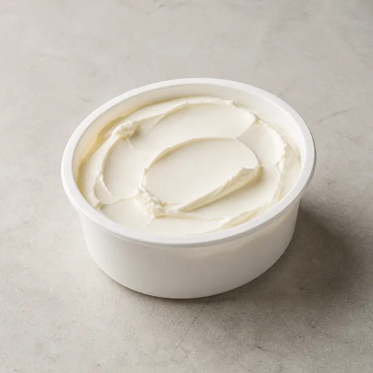 Cream cheese on a neutral surface
