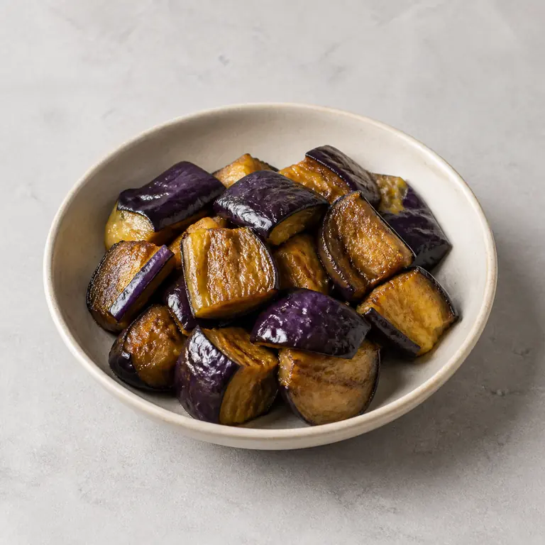 Eggplant (cooked) on a neutral surface