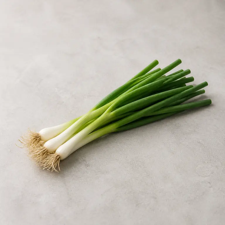 Green onions on a neutral surface