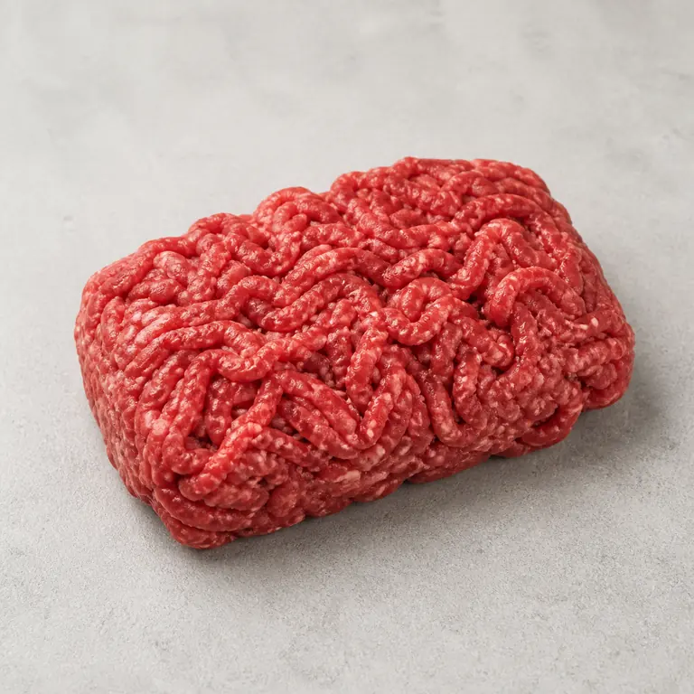 Ground beef (raw) on a neutral surface