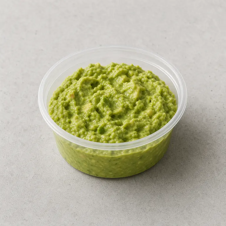 Guacamole (opened) on a neutral surface