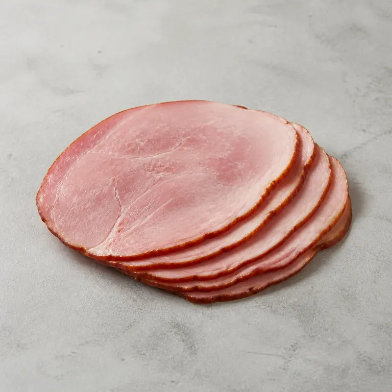 Ham (cooked) on a neutral surface