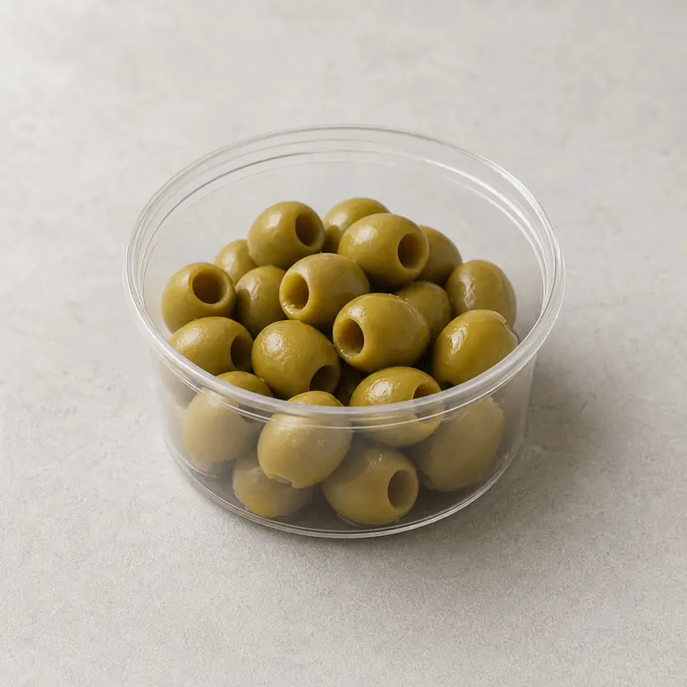 Olives (opened) on a neutral surface