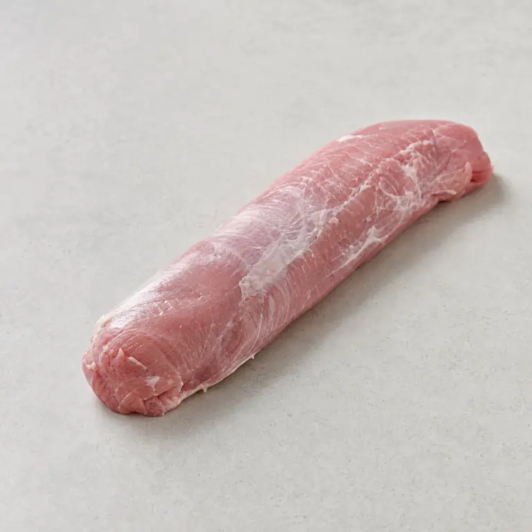 Pork tenderloin (raw) on a neutral surface