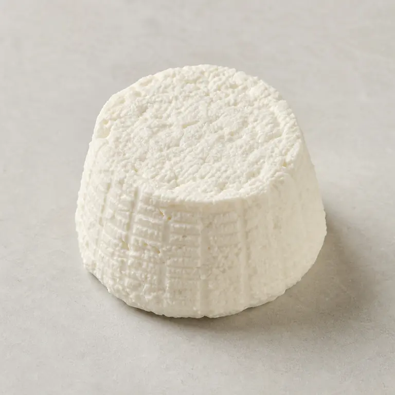 Ricotta cheese on a neutral surface