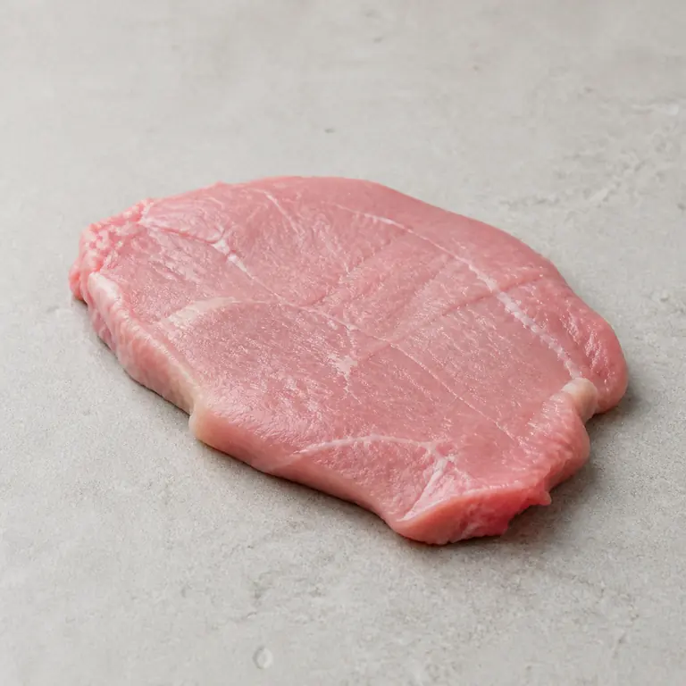 Veal (raw) on a neutral surface